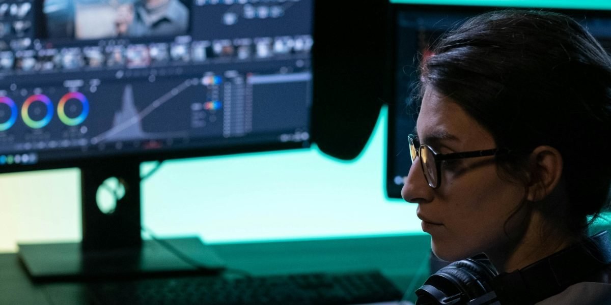 Editor responding to messages in a bright office