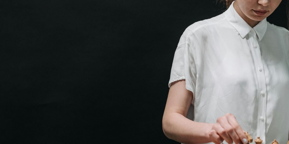 A person looking thoughtfully, symbolizing the need to separate signal from noise in rapidly evolving tech.