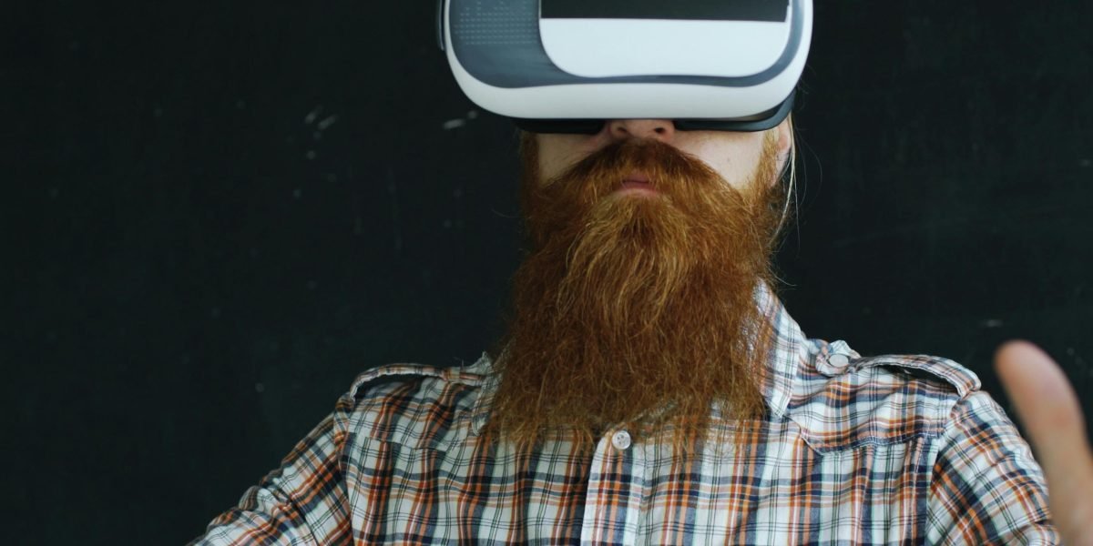 A professional contemplates new trends and ideas, symbolizing the challenge of staying ahead in tech.