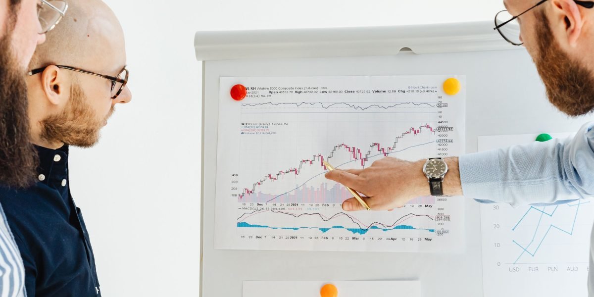 A team collaborating to understand market growth and future trends in the app ecosystem.
