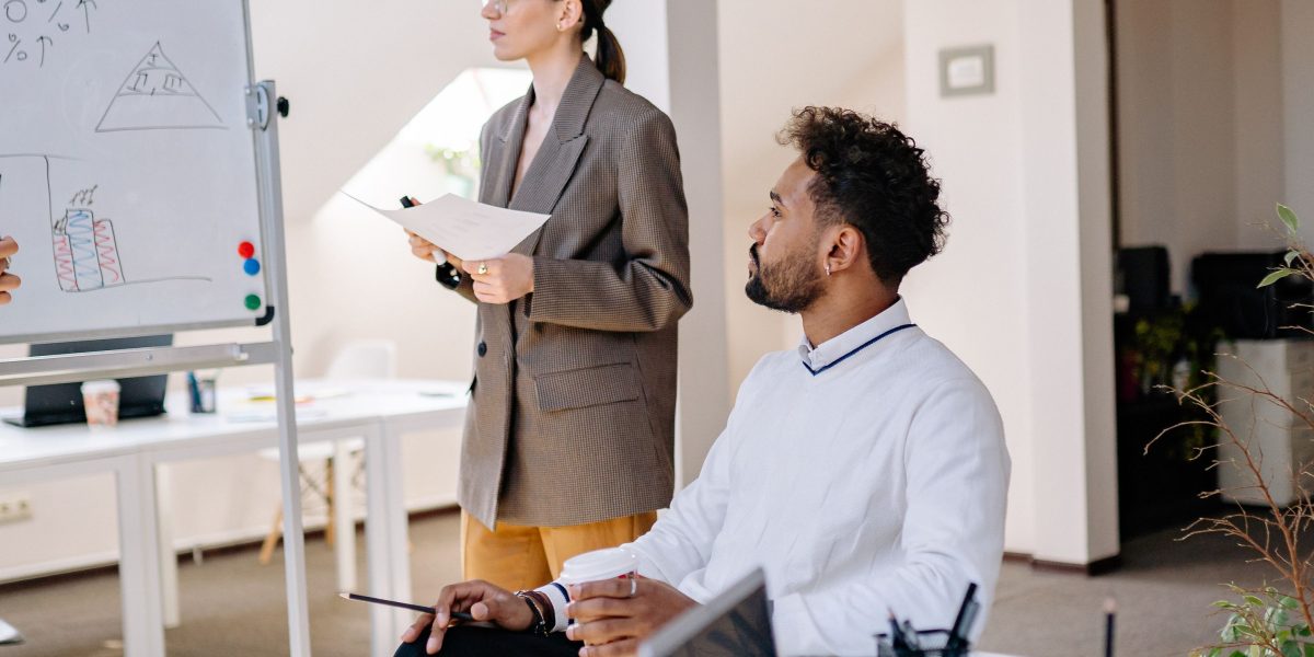 Leaders guide their teams through the strategic adoption of AI, considering factors like cost, scalability, and skill development.