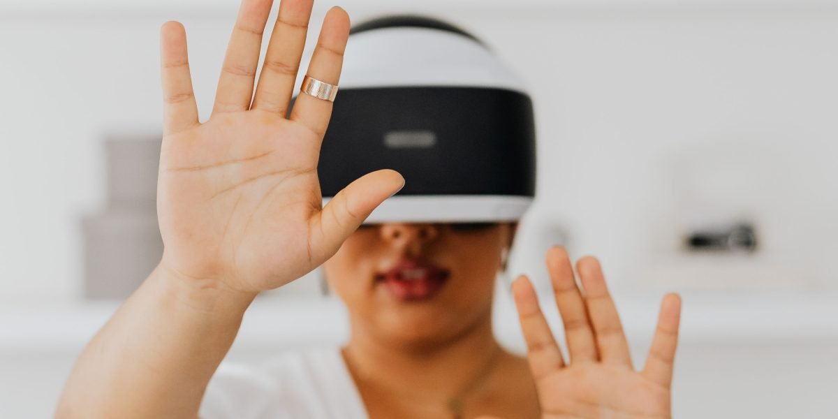 A person demonstrating adaptability and engagement with new technologies, symbolizing the evolving job market.