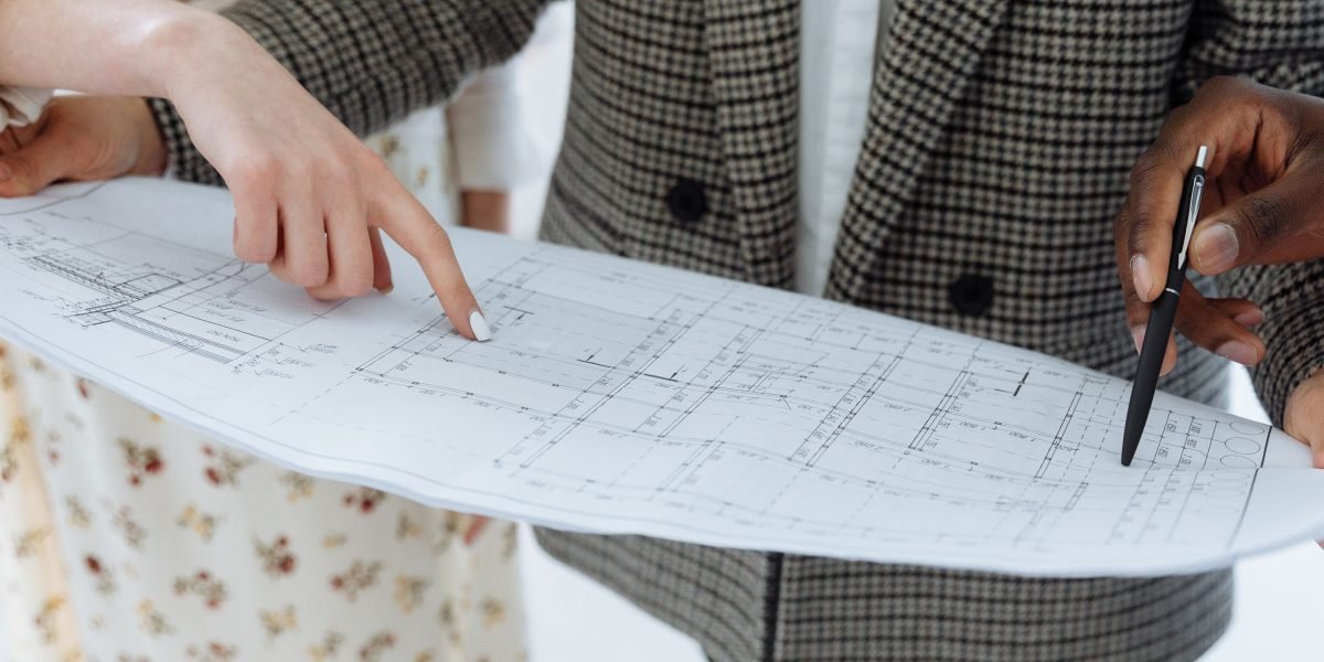 Teams examine the architectural blueprint, ensuring all components work together for a smooth cloud environment.