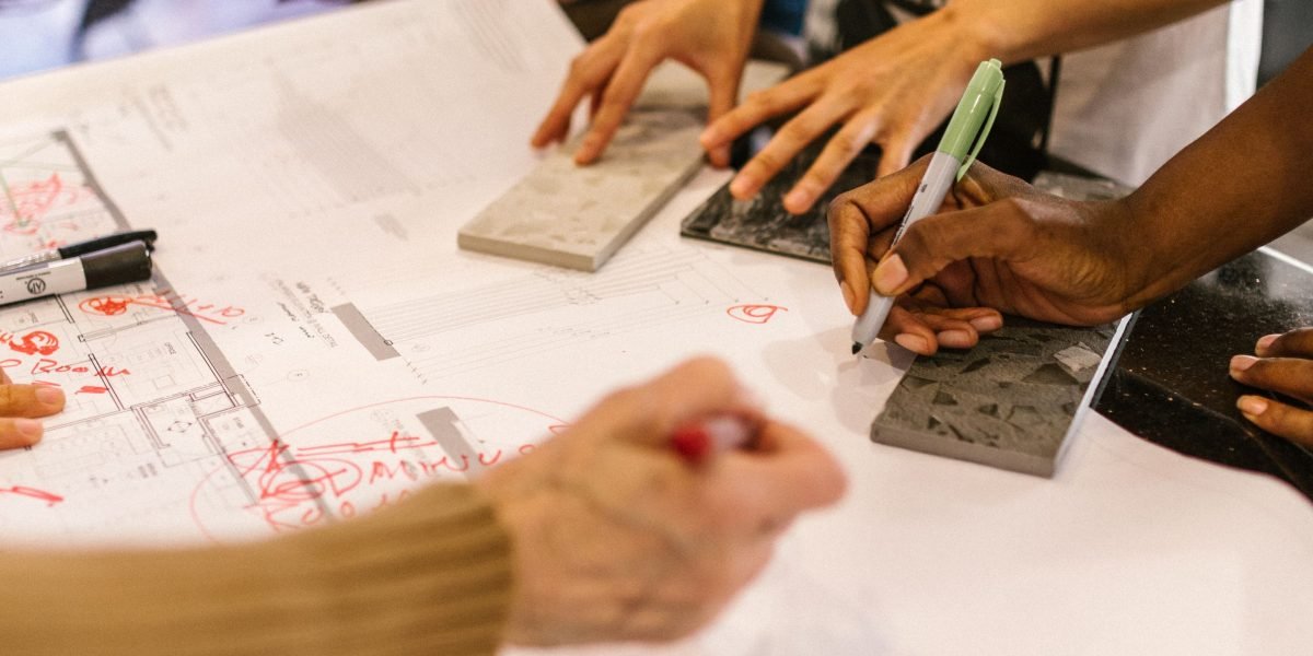 A diverse team actively collaborating, demonstrating the project management and teamwork aspects of software engineering.