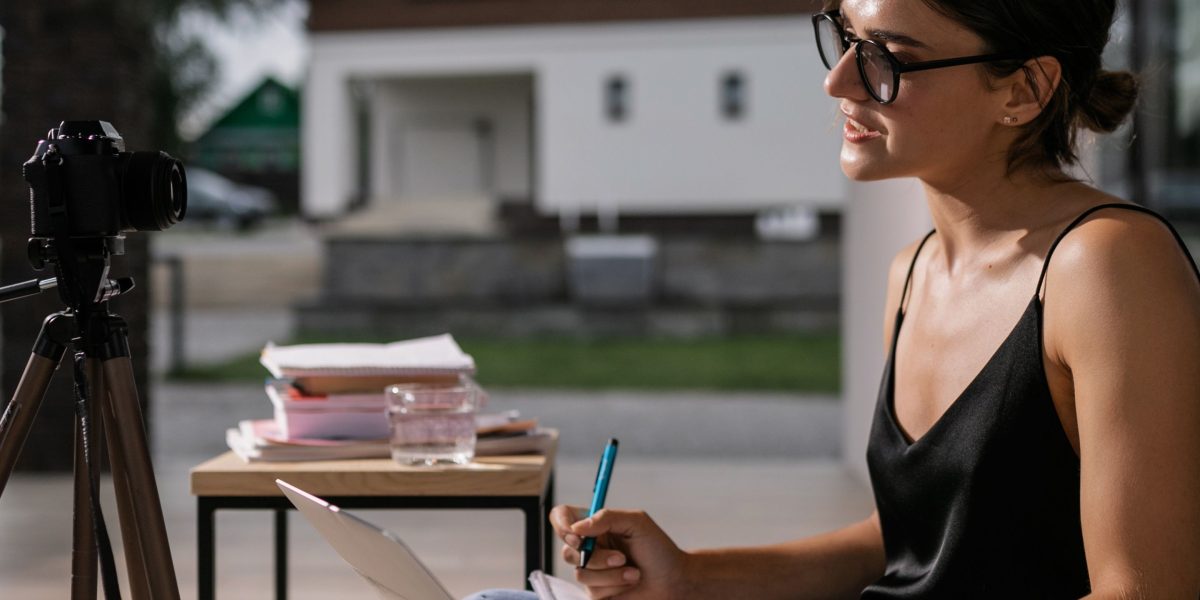 A person focused on an online course or digital learning platform, emphasizing flexible education paths.