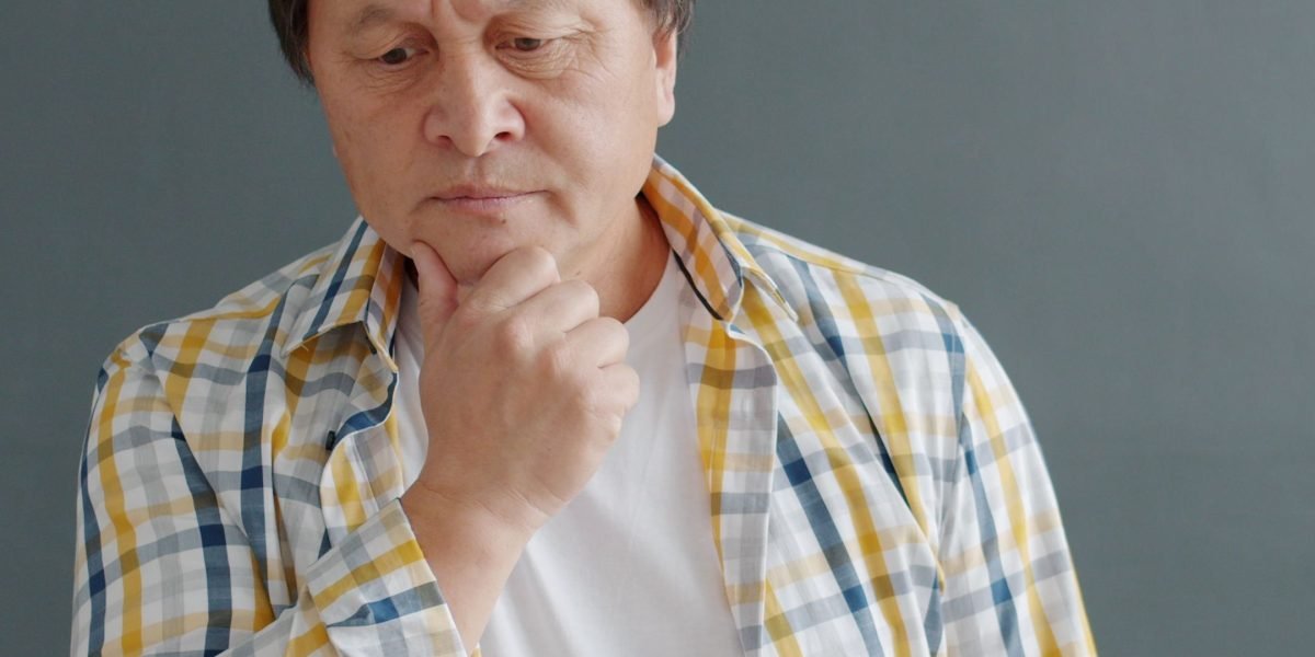 A person deep in thought, representing the process of making careful decisions amidst many options.