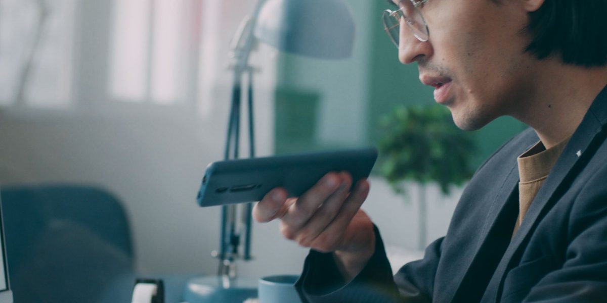 A professional carefully analyzing data and reports, looking for meaningful insights beyond superficial metrics.