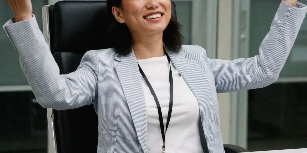 A person celebrating a career milestone, symbolizing the positive outcomes and ROI from effective learning paths.