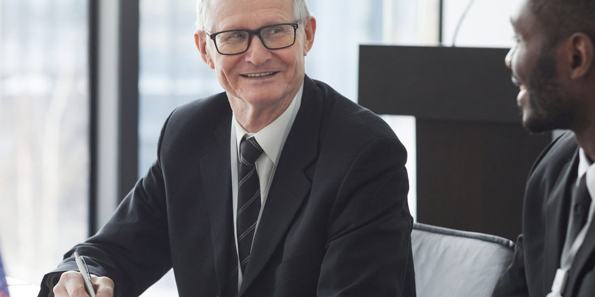 International representatives collaborate to navigate the fragmented global regulatory landscape of AI policy.
