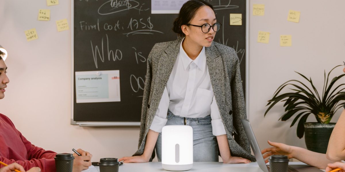 A diverse team collaboratively working on a product design, symbolizing the central role of a product development engineer in bringing ideas to fruition.