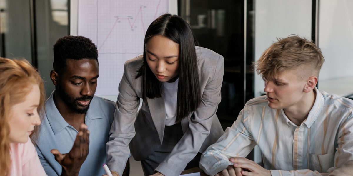 A diverse team works together, leveraging varied skills for a common goal.