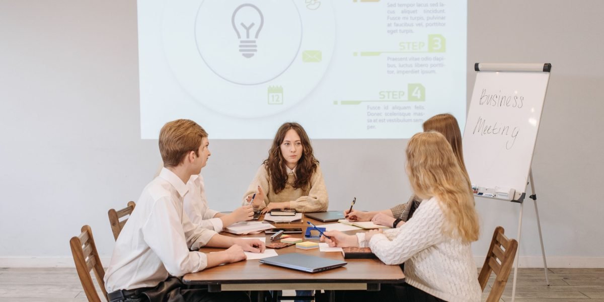 A diverse team collaboratively brainstorming new ideas, reflecting the need for speed and innovation in app development.